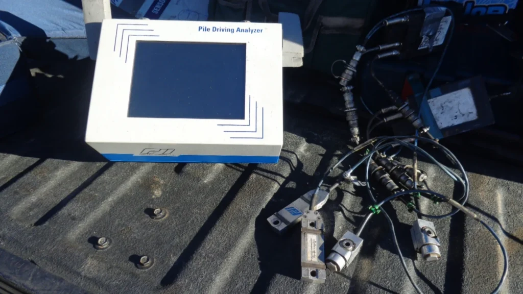 Pile driving analyzer with strain gauges for dynamic pile testing