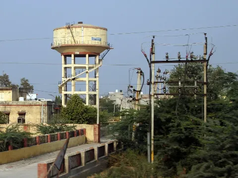 RCC overhead water reservoir on framed staging (representative image)